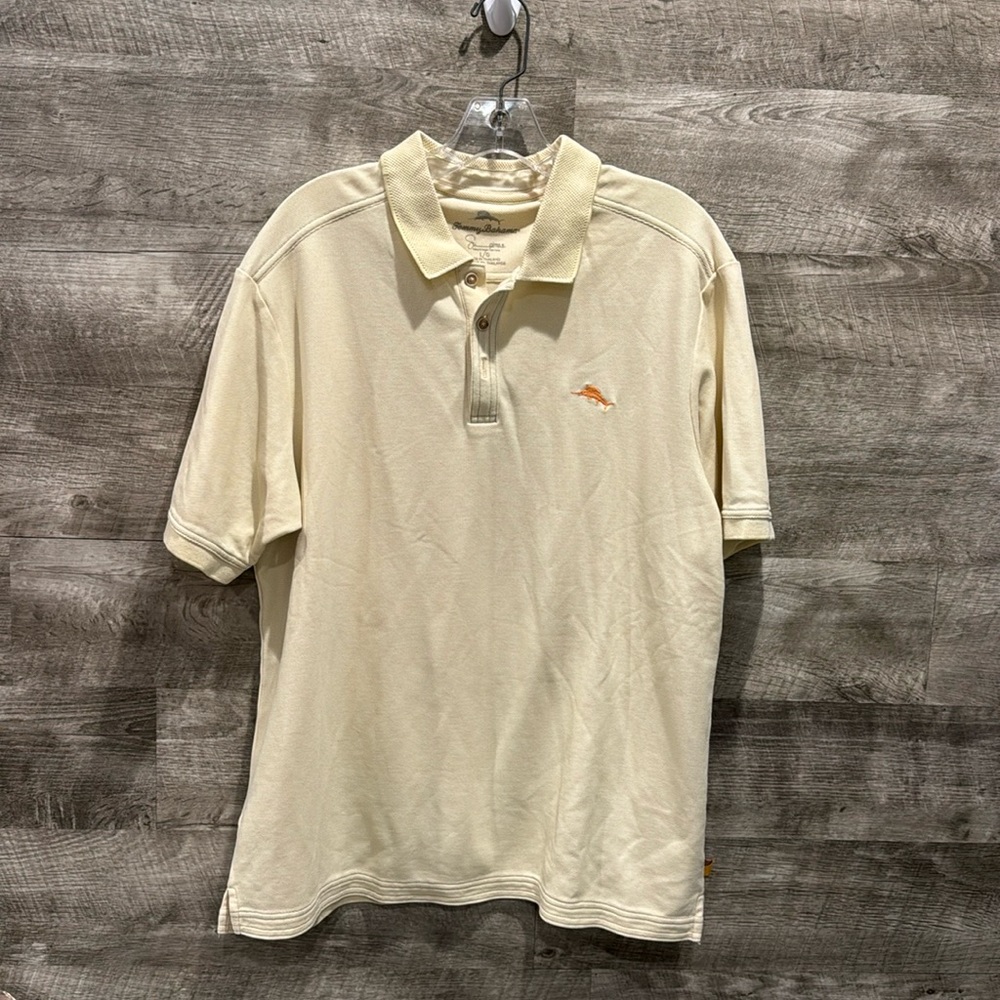 Tommy Bahamas Pre loved Short Sleeves Polo in a Cotton/ Polyester blend.
